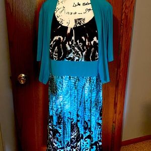 Teal sleeveless dress with teal jacket